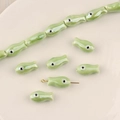 Handcrafted light green ceramic fish beads for DIY jewelry bracelets and necklaces - Pale Green