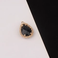 Macro shot of gold-plated lace-edge water drop pendant with faceted black crystal - Black (7#)