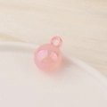 Detailed view of pink candy-colored pearl luster round bead with hoop for DIY crafts - Large / Pink