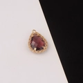 Macro view of purple faceted crystal waterdrop pendant in gold lace metal frame - Purple (5#)