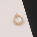 Detailed view of faceted crystal teardrop pendant with golden scalloped metal edge - Transparent (6#)