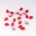 Macro shot of 4x6mm oval acrylic gems with polished red top and silver metallic flat base - 4x6 / Translucent Red