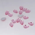 Detailed macro view of faceted pink acrylic teardrop flatback gems for DIY jewelry - 7x10mm / Pink