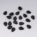 Macro view of 7x10mm black teardrop flatback acrylic stones for DIY jewelry crafts - 7x10mm / Black