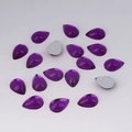 Macro shot of purple teardrop acrylic rhinestones with silver flat back for DIY crafts - 7x10mm / Purple