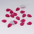 Macro view of 7x10mm rose red acrylic teardrop rhinestones with silver foil flat back - 7x10mm / Rose Red
