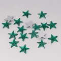 Macro shot of 10mm emerald green faceted star rhinestones with flat back for DIY crafts - 10mm / Emerald Green (9#)