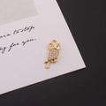 Detailed close-up of a gold-plated owl pendant with micro-set zircons on a branch - Owl Shape (4#)