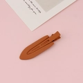 Close-up of light brown matte metal duckbill hair clip with embossed brand lettering - Light Brown (10#)