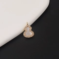 Macro shot of gold-plated Wulu pendant with white mother-of-pearl and cubic zirconia - Gourd Style (4#)