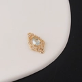 Detailed view of teardrop zircon pendant with light blue stone and gold filigree - Light Blue (2#)