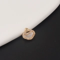Macro detail of a gold-plated ballet girl butterfly lock pendant with white shell inlay - Ruyi Lock Style (5#)