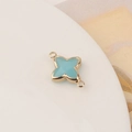 Macro view of a light blue crystal four-leaf clover pendant with gold-plated finish - Light Blue Style(1#)