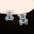 Macro view of iridescent holographic resin bears with vibrant color gradient effect - Style 2 (Ice Blue)