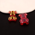 Macro detail of iridescent 3D bear charms in red and gold plated resin materials - Style 3 (Taro Purple)