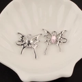 Detail of silver alloy butterfly pendant and ear cuff with pink crystal on shell tray - 3# Hollow Butterfly Style (Pink Rhinestone)