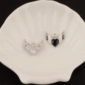 Detailed macro view of Y2K silver heart wing charms with black inlay on a shell tray - 6# Large Winged Heart Style (Black Rhinestone)