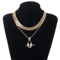 Zweilagige goldene Panzerkette mit einem funkelnden Strass-Anhänger in Form eines Herzens - Gebrochenes Herz Anhänger mit Iced Out Panzerkette Halskette / Gold