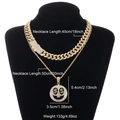 Gold iced-out Cuban link chain set with a diamond smiley face pendant and dollar sign eyes - Cuban Link And Rope Chain Set 2 / Gold