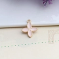 Detail shot of light pink clover charm with golden alloy edges and hanging ring for DIY - Pink Four-Leaf Flower
