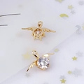 Detail of golden wing-shaped DIY pendant with a central sparkling zircon stone - Angel Wings Large Stone Shape (4#)