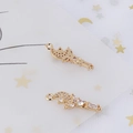 Detailed macro view of gold-plated crescent moon and star pendant with white zircon inlays - Moon Star Style (1#)