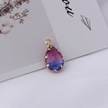 Macro shot of a teardrop-shaped crystal pendant with purple-blue gradient and gold edges - 9# Purple Blue Gradient / 10*19MM