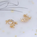 Macro shot of gold crescent moon charms with stars and sparkling zircon stones - Style 5 Moon and Star / 100 Units Pack