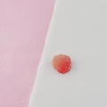Macro detail of gradient heart resin charm with a frosted texture for DIY craft making - Orange Red Heart Style