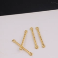 Detail of gold metal jewelry connector bars with spiral texture and double eyelets - Spiral Pattern Style / Gold
