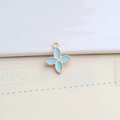 DIY light blue enamel four-petal flower charm with gold alloy frame for jewelry making - Blue Four-leaf Flower