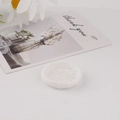 Detailed top view of miniature white resin woven basket with intricate vine texture - Round White