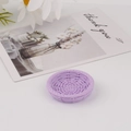 Detail view of mini purple round resin tray with faux woven texture on a white backdrop - Round Purple