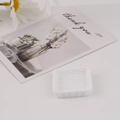 Detailed view of miniature white resin square tray with simulated woven basket texture - Square White