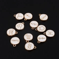 Détails des breloques zodiaque en alliage doré avec émail blanc et noms des constellations - Collection Complète Constellations du Zodiaque / Blanc