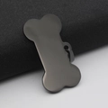 Bone-shaped stainless steel dog tag pendant in gunmetal finish with matte texture - 50mmx28mmx1.8mm / Black