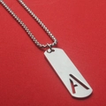 Minimalist silver steel necklace featuring rectangular pendant with cutout letter A - Letter A