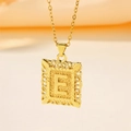 Collier en acier inoxydable doré avec pendentif lettre E en relief et bordure évidée - Lettre E (Pendentif uniquement (sans chaîne))