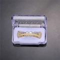 Eén rij gouden grillz met witte zirkonia's in een transparant sieradendoosje - Tand Grillz Boven (S00056G-1) / 18K goud / Goud
