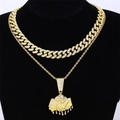 Macro detail of gold plated iced-out hip hop necklace set on black velvet display - Cuban Link And Rope Chain Pendant / Gold