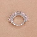 Detailed view of silver crown nose ring with pink zircons on soft silk texture - Silver Pink Style