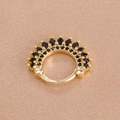 Detail of gold crown earrings with micro-paved black zircons on silk background - Gold and Black Style