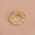 Macro shot of gold hoop earrings with gradient purple crystals on textured silk - Gold Purple Style