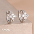 Macro view of 6mm silver clover hoop earrings with sparkling cubic zirconia stones - 6mm-Silver White-1 Pair