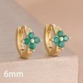 Macro shot of 6mm gold-plated clover earrings with green zircon stones on luxury box - 6mm-Gold Green-1 Pair