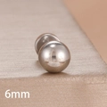 Macro shot of a 6mm polished silver ball stud earring made of smooth stainless steel - 6mm Style (Y27461) / Silver