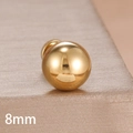 Macro shot of 8mm gold minimalist ball stud earring with mirror finish on textured surface - 8mm Style (Y27461) / Gold
