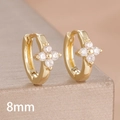 Detailed macro view of 8mm golden hoop earrings featuring sparkling zircon clover patterns - 8mm-Gold White-1 Pair