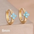 Macro shot of 8mm gold huggie earrings with turquoise blue quatrefoil clover design - 8mm-Gold Blue-1 Pair