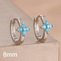 Detail view of 8mm silver hoop earrings with blue zircon four-leaf clover design - 8mm-Silver Blue-1 Pair